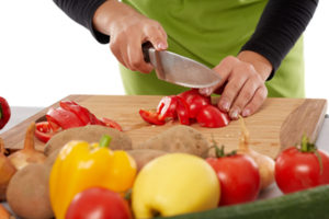 Woman chopping vegetables